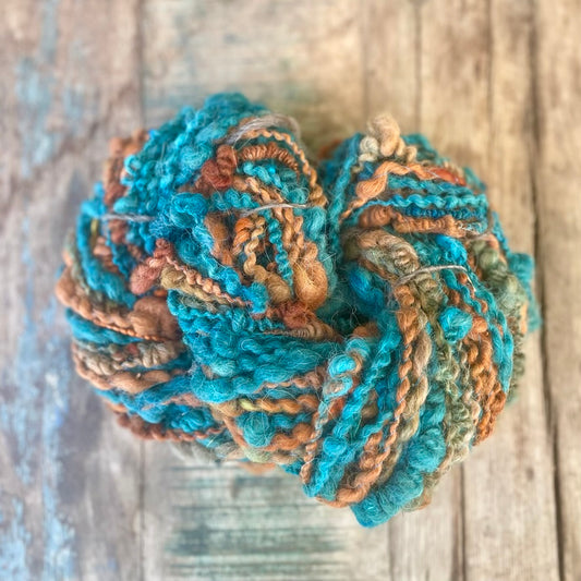 Rust Tide Bouclé Handspun Hand Dyed Alpaca Art Yarn in Teal Brown Rust