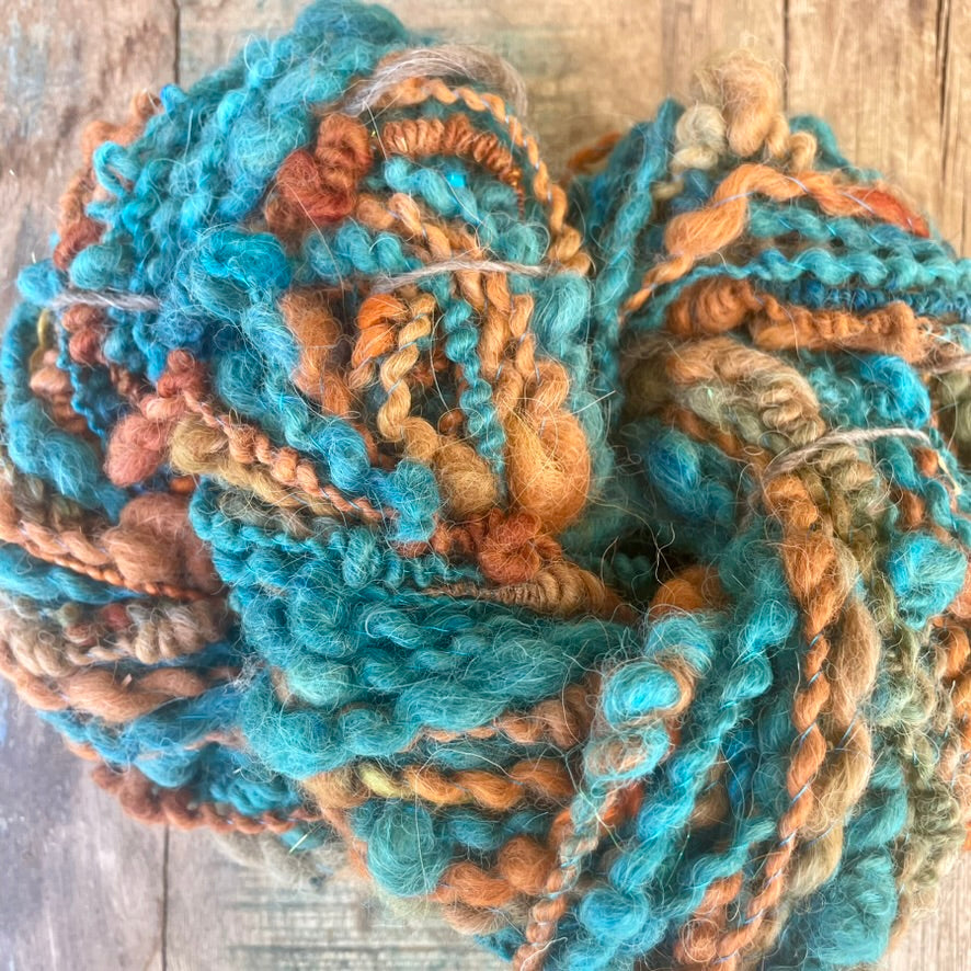 Rust Tide Bouclé Handspun Hand Dyed Alpaca Art Yarn in Teal Brown Rust