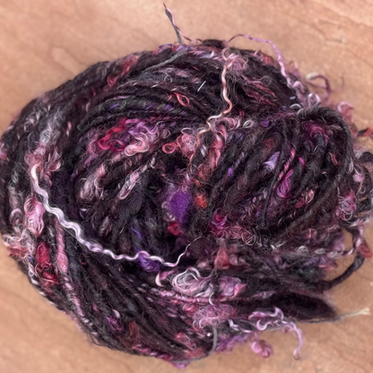 handspun angora yarn, purple and black