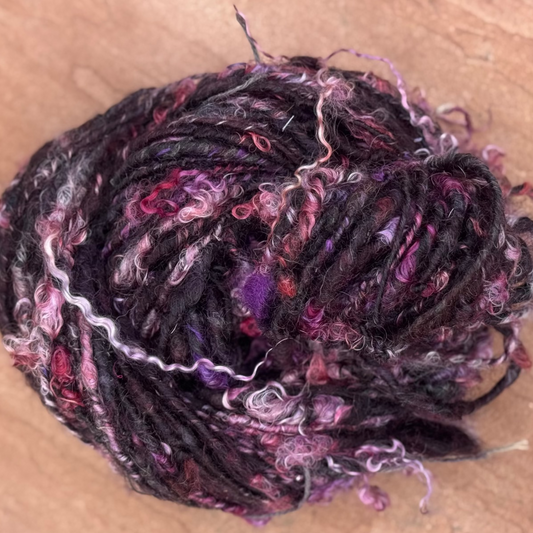 handspun angora yarn, purple and black